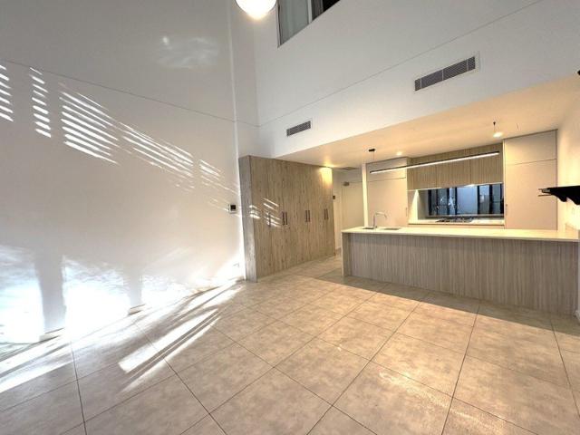 Stylish Two Level Apartment with Courtyard in a Prime Location