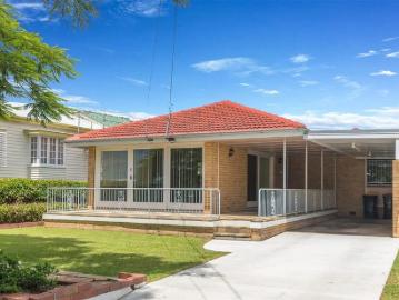 Stylish Three Bedroom House in a great location Rent includes lawn maintenance