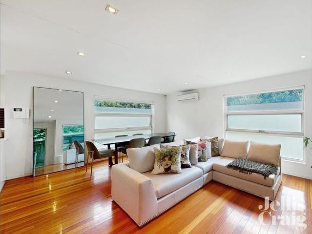 Stylish Three Level Townhouse with Private Outdoor Spaces in Glen Iris