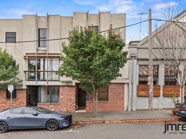 Stylish Three Level Townhouse with Warehouse Character and City Fringe Convenience