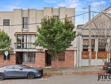 Stylish Three Level Townhouse with Warehouse Character and City Fringe Convenience