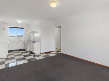 Stylish Top Floor Unit With Great Views Just Minutes from the City!