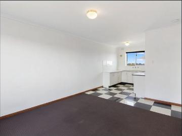 Stylish Top Floor Unit With Great Views Just Minutes from the City!