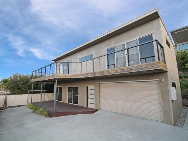 Stylish Townhouse with Sea Views & Secure Rental Income