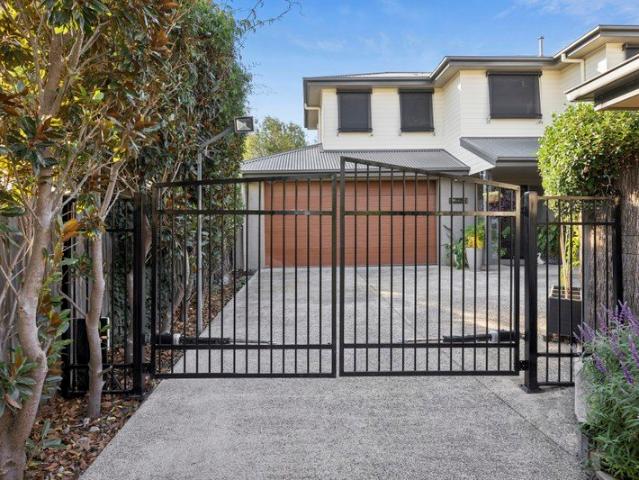 Stylish Townhouse and Low Maintenance Living on Its Own Title