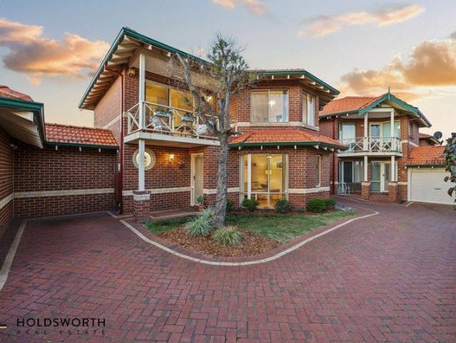 Stylish Townhouse Living in an Enviable Location