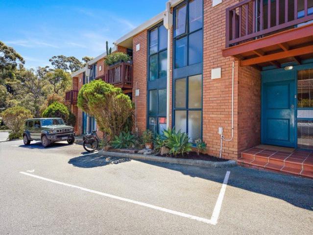Stylish Unit with Large Courtyard & Balcony Amazing Location Next To Park!