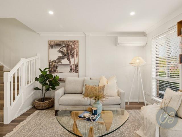 Stylish Updated Townhouse with Rare Double Garage & Spacious Courtyard