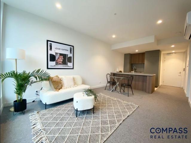 Stylish 1 Bedroom Apartment with Rooftop Amenities