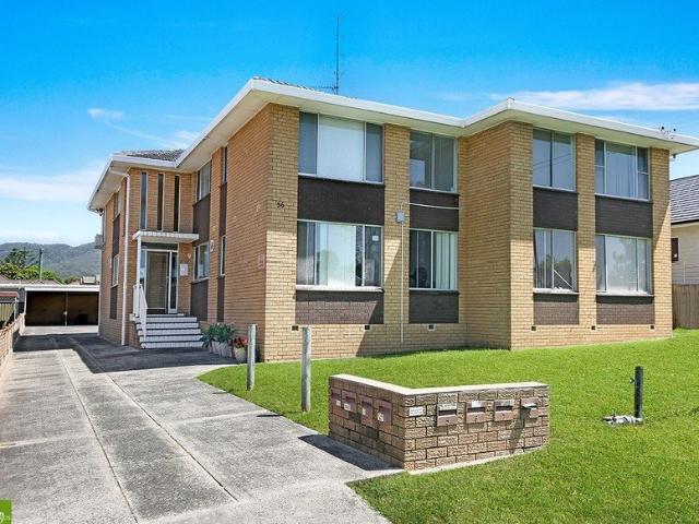 STYLISH 2 BEDROOM UNIT WITH COASTAL CHARM!