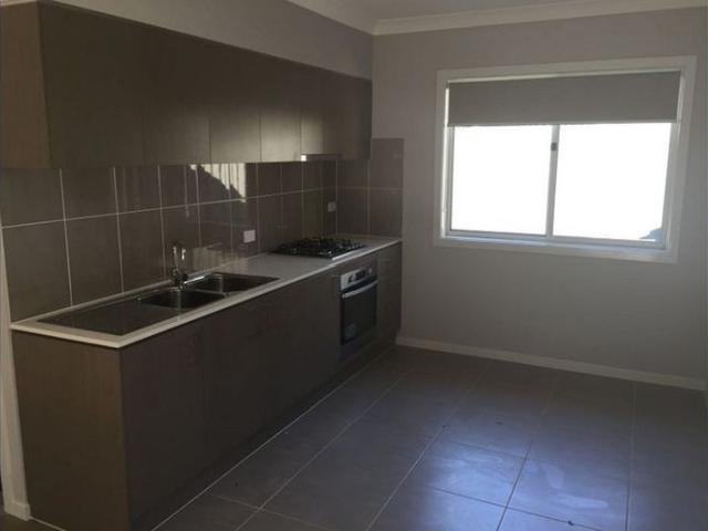 Stylish 2 Bedroom Home with Private Yard & Utilities Included