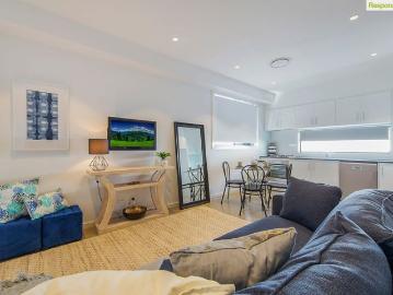 Stylish 3 Bedroom Townhouse with Modern Luxury & Space for Two Cars!