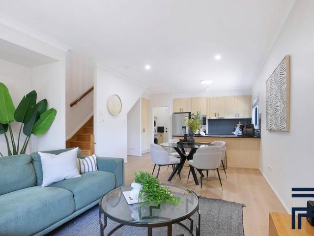Stylish 3 Bedroom Townhouse with Private Courtyard!