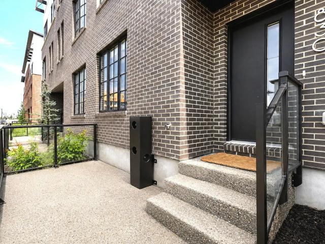 Stylish 3 Bedroom West District Townhome | 1,838 Sq.Ft. | Double Garage | Steps