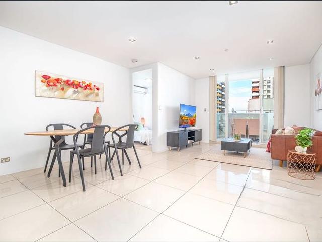 Stylish 8th Floor Apartment with District Views