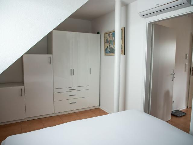 Stylishly furnished, quiet 3 room attic apartment with balcony 95qm in Bad Vilbel, Bad Vilbel Amsterdam Apartments for Rent