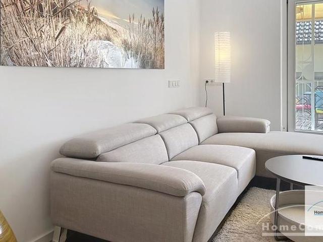 Stylishly furnished 3 room apartment with a sunny rooftop terrace in Sendling