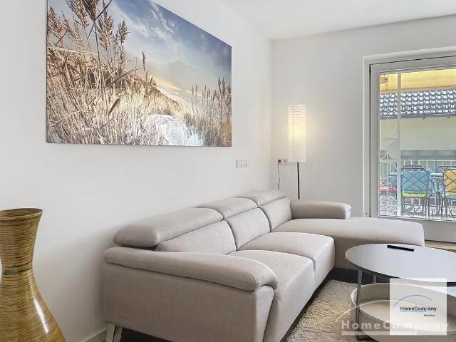 Stylishly furnished 3 room apartment with a sunny rooftop terrace in Sendling
