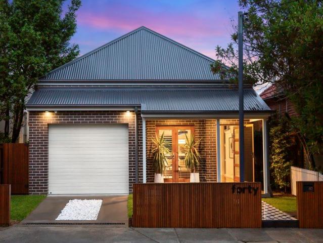 Stylishly Modern family oasis in a coveted address