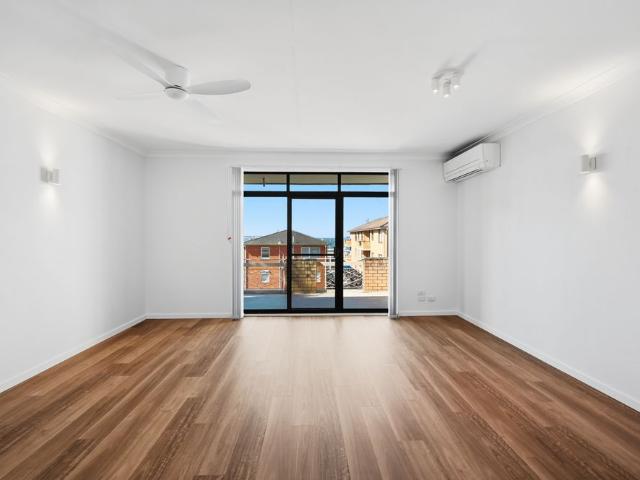 Stylishly Renovated Beachside Apartment with Water Views