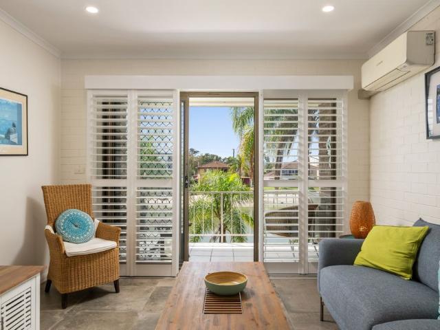 Stylishly Renovated & Fully Furnished Apartment with Canal Views