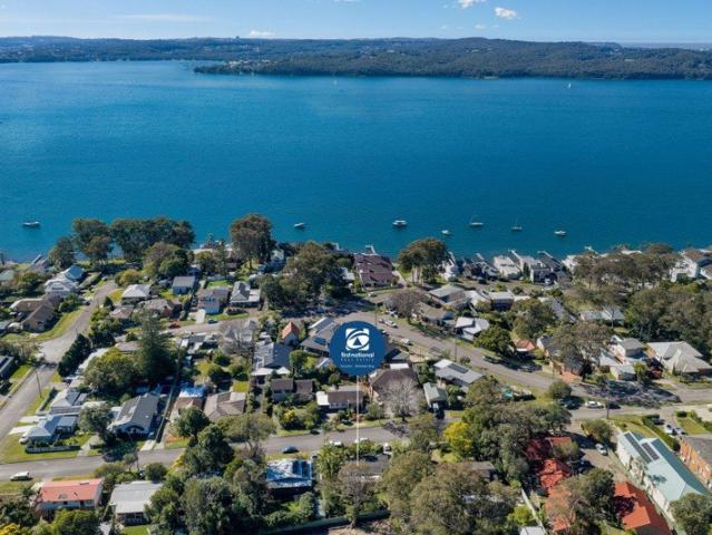 Stylishly Renovated Family Home Offering the Ultimate Lakeside Lifestyle