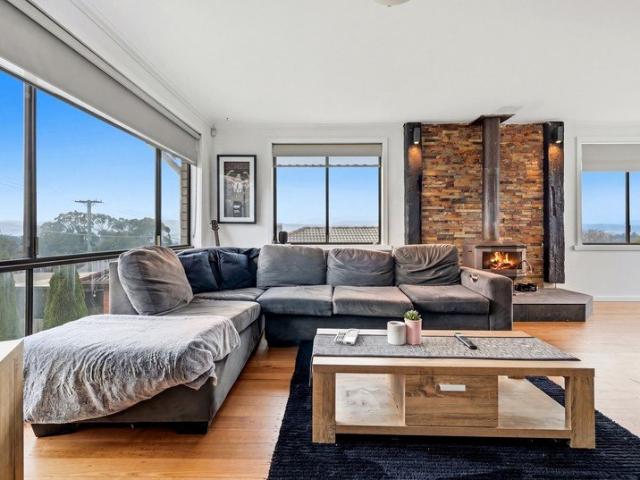 Stylishly Renovated Home, Low Maintenance with Expansive Garaging and Lifestyle Appeal