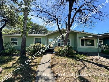 MOVE IN SPECIAL* Stylishly Renovated Home with Fenced Backyard & Two Living Areas!