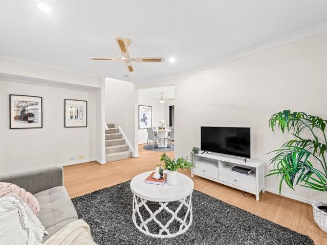 Stylishly Renovated Townhouse with Rare Double Garage