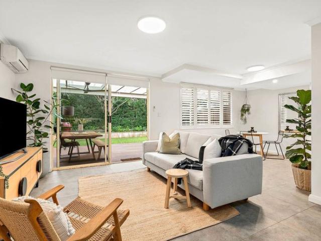 Light Filled Renovated Townhouse Offering Comfort and Convenience