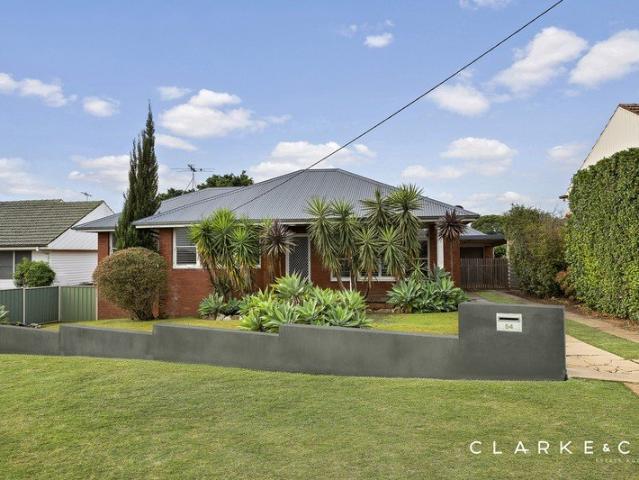 STYLISHLY RENOVATED WITH TIMELESS CHARACTER APPEAL!