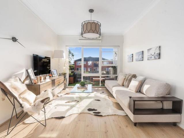 Stylishly updated apartment steps from the beach