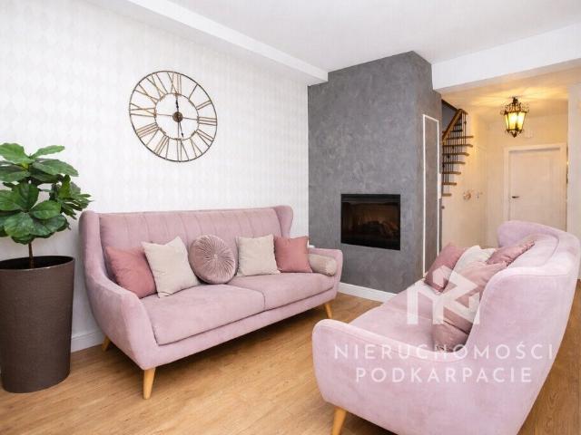 Stylowy dom szeregowy 117,49 m² z ogrodem i garażem