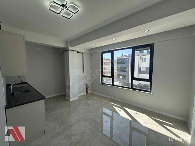 SÜMBÜLLER'DEN ŞİRİNTEPE MH. ARA KAT ZEMİNDEN ISITMA 1+1 DAİRE