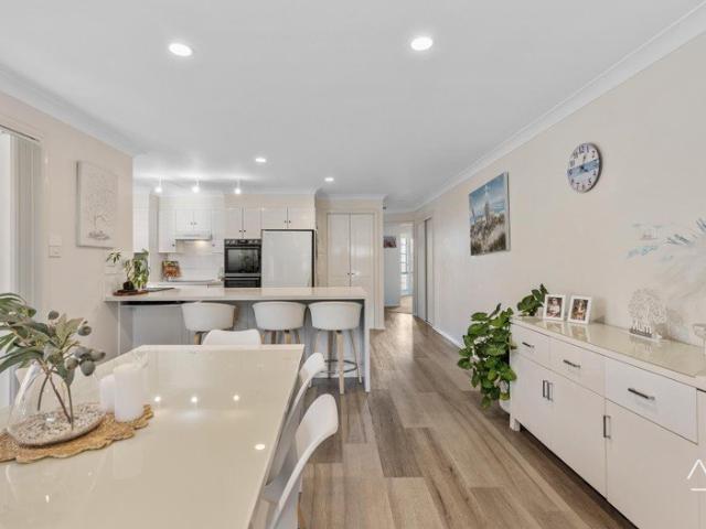Sun Drenched Coastal Living with Plenty of Storage