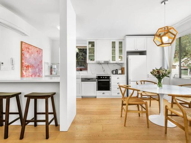 Sun Drenched Coastal Sanctuary with Designer Interiors, Spacious Sunroom & Lock Up Garage