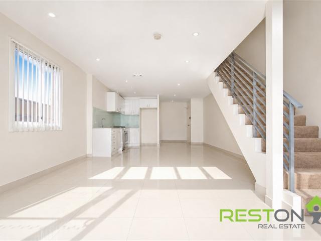 Sun drenched double storey apartment