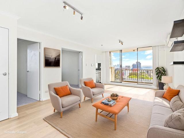 Sun Drenched Designer Apartment with City Views and Double Garage