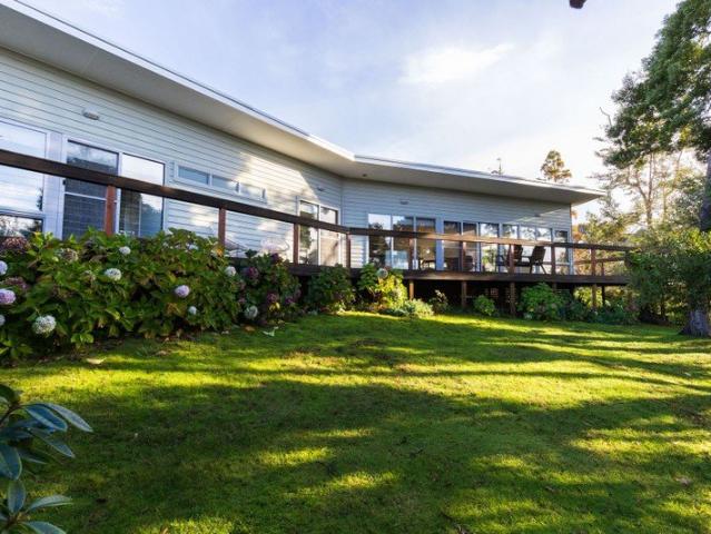 Sun Drenched Living with Tranquil Garden Views