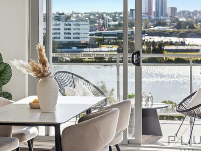 Sun Drenched Luxury Waterfront Living with Panoramic Views
