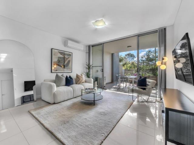 Sun Drenched North Facing Apartment with a Private Parkside Courtyard