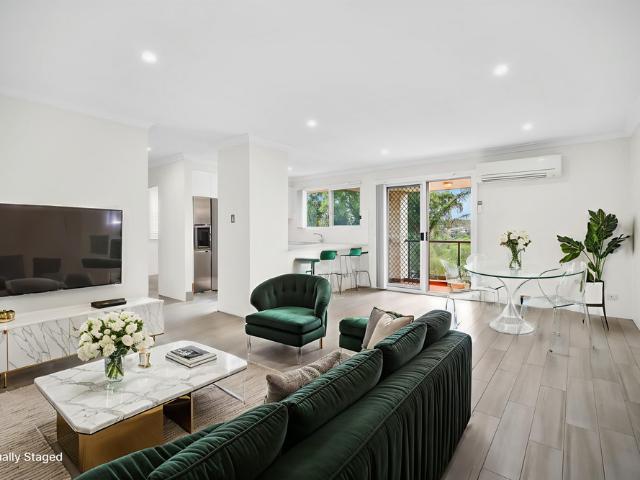 Sun Drenched Top Floor Apartment with Tandem Garage