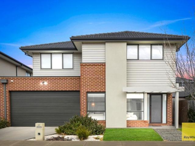 Sun Filled North Facing Home with Multiple Living Areas