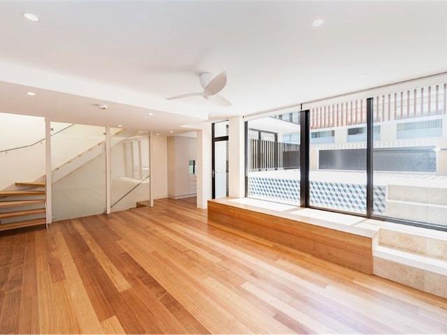 Sun Filled Two Level Residence In A Boutique Complex