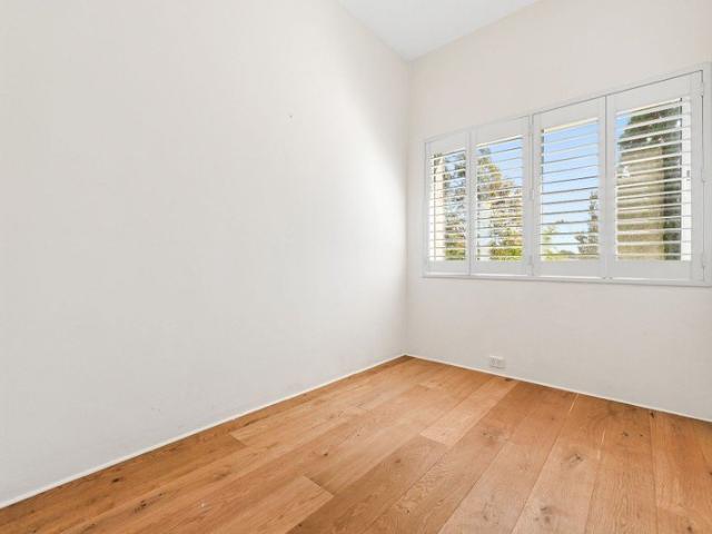 Sun Filled Three Bedroom Apartment with Parking