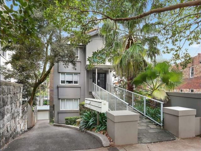Sun Filled Three Bedroom Apartment with Parking