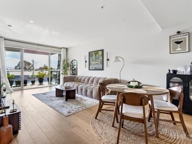 Sun Filled Top Floor Living with Expansive North Facing Balcony