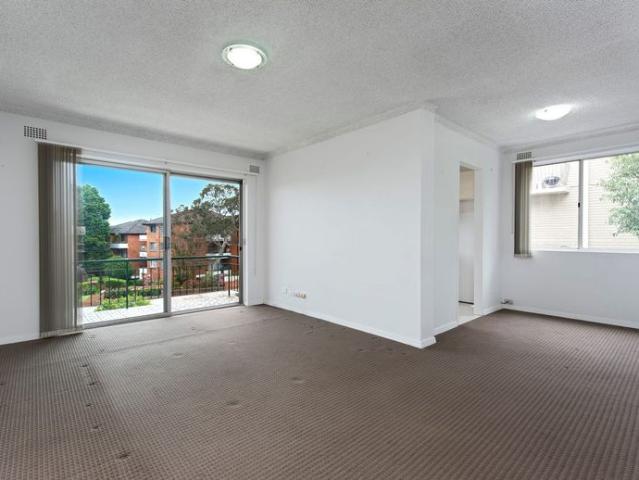 Sun filled Unit in Convenient Location