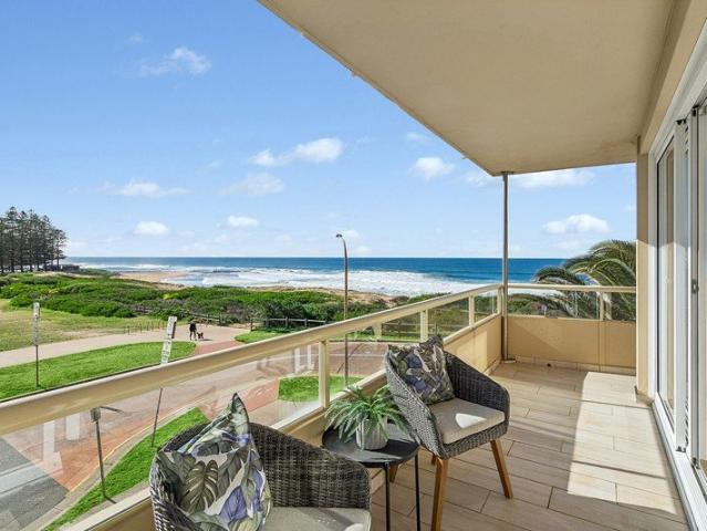 Sun kissed beachfront haven with spectacular surf and sunrise views