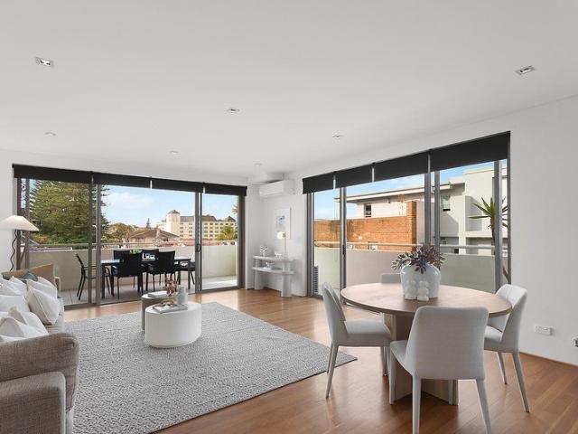 Sun Soaked Beachside Apartment Revealing Ocean Views
